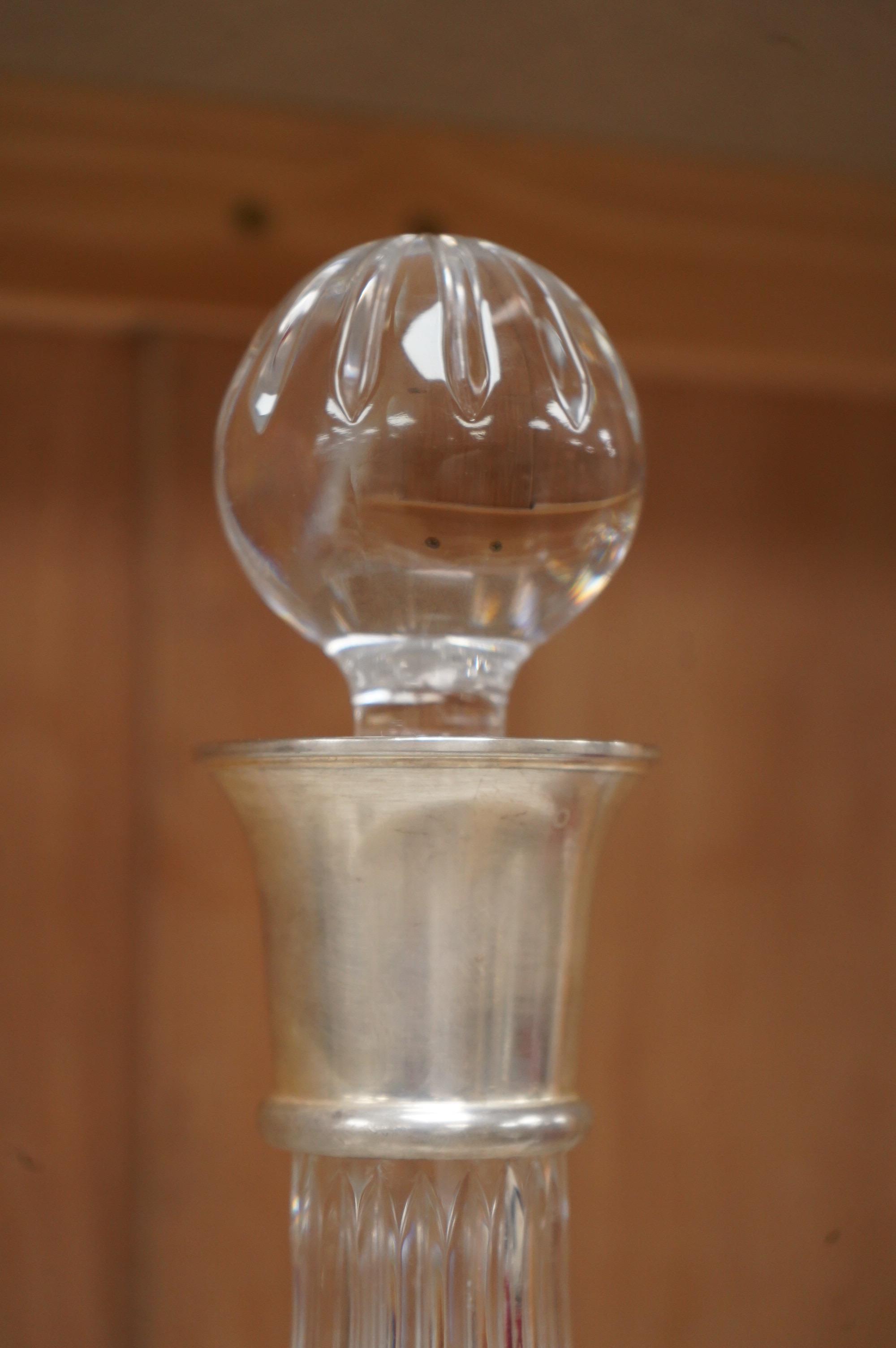 A silver mounted decanter, hallmarked for Sheffield, 2000, 27cm high